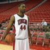 UNLV senior forward Darris Santee shows off the team's new home white uniforms.
