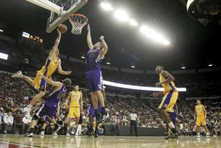 Los Angeles Lakers forward Adam Morrison puts up a shot against the Sacramento Kings during the second half of their exhibition game Thursday at the Thomas & Mack Center. The Lakers won 98-92.