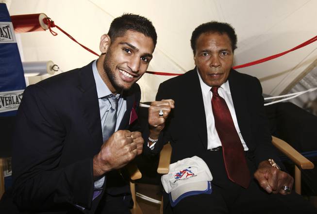 Muhammad Ali, right, and Amir Khan at the European Jumping and Dressage Championships in Windsor, England, on Friday, Aug. 28, 2009. The appearance is part of a weeklong tour of the United Kingdom and Ireland to help promote Ali's charitable work.