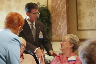 Former state Sen. Joe Heck, a Republican candidate for Congress, greets Judy Kidd during a luncheon hosted by the Boulder City Republican Women on Thursday at Railroad Pass Casino.  Heck is running for the seat currently held by U.S. Rep. Dina Titus (D-Nev.).