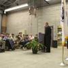 Executive Director Tim Tetz, of the Nevada Office of Veteran Services, welcomes veterans and distinguished guests to the dedication ceremony of the new 5,400-square-foot maintenance facility Thursday at the Veterans Memorial Cemetery in Boulder City.