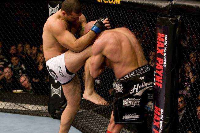 Mauricio "Shogun" Rua, left, knees Mark Coleman during their match at UFC 93 on Jan. 17, 2009 in Dublin, Ireland. Rua won by third-round TKO.