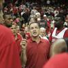 UNLV head coach Lon Kruger talks to his players after the Rebels FirstLook scrimmage Oct. 16 at the Thomas & Mack Center.