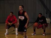 Chace Stanback (left) and Anthony Marshall sit at Monday's UNLV practice at Impact Academy. A sprained left ankle has sidelined Stanback, and a right hamstring injury has kept Marshall from playing.