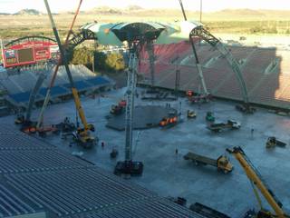 Workers erect the massive 360-degree stage for Friday's U-2 concert at Sam Boyd Stadium in Las Vegas.