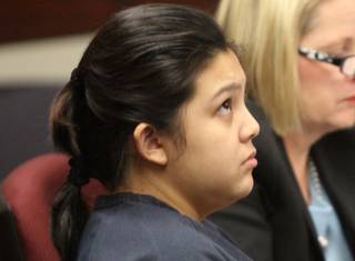 Carmela Camero, who is accused of killing her newborn son, appears in Henderson Justice Court Wednesday with attorney Kristine Kuzemka.