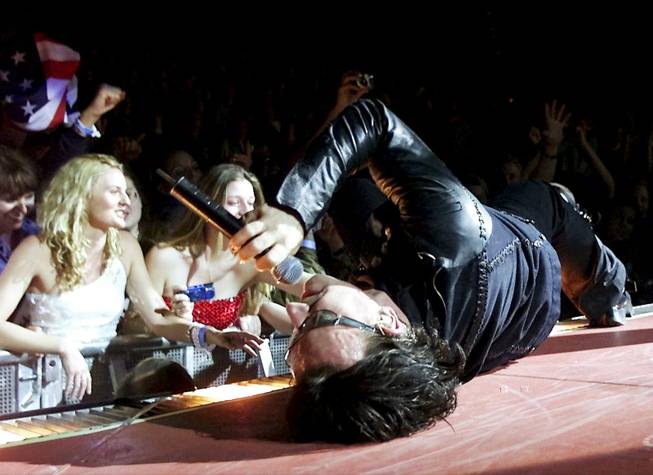 Bono, interacting theatrically during U2's November 2001 show at the Thomas & Mack Center.