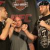 Ben Rothwell and Cain Velasquez face off during a pre-fight press conference Thursday at the Westside Pavilion Mall in Los Angeles. The two will headline Saturday's fight at the Staples Center.
