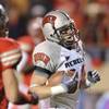 UNLV's Ryan Wolfe scores a touchdown against New Mexico on Oct. 24, 2009, in Albuquerque, N.M. UNLV won 34-17. UNLV's Ryan Wolfe scores a touchdown against New Mexico on Oct. 24, 2009, in Albuquerque, N.M. UNLV won 34-17.