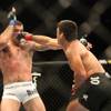 Lyoto Machida, right, connects with Shogun Rua Saturday night during the main event of UFC 104 at St