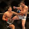 Lyoto Machida blocks a kick from Shogun Rua during the main event of UFC 104 Saturday night at Stapl