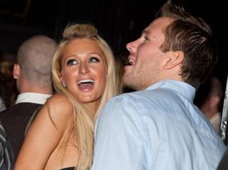 Paris Hilton and Doug Reinhardt at his 24th birthday celebration at Body English in the Hard Rock Hotel on Oct. 24, 2009.