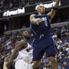 Dallas Mavericks' Shawn Marion, right, scores on a layup past Washington Wizards' DeShawn Stevenson during the first half of an NBA preseason basketball game, Friday, Oct. 9, 2009, in Washington. The Mavericks won 123-115. Dallas Mavericks' Shawn Marion, right, scores on a layup past Washington Wizards' DeShawn Stevenson during the first half of an NBA preseason basketball game, Friday, Oct. 9, 2009, in Washington. The Mavericks won 123-115.