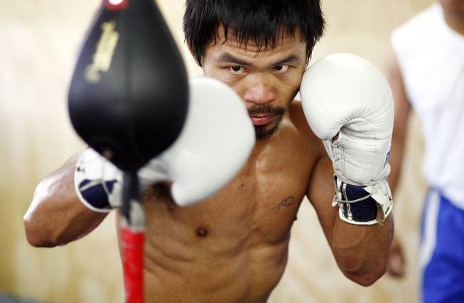 Filipino boxer Manny Pacquiao works out at Freddie Roach's WildCard Boxing Club in Hollywood, Calif., on Oct. 24, 2009.