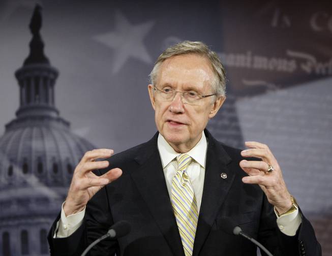 Senate Majority Leader Harry Reid gestures while speaking on health care reform during a news conference, Monday, Oct. 26, 2009, on Capitol Hill in Washington.
