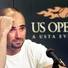
Andre Agassi speaks after a loss at the 1997 U.S. Open in New York. His autobiography contains an admission that he used crystal meth that year.