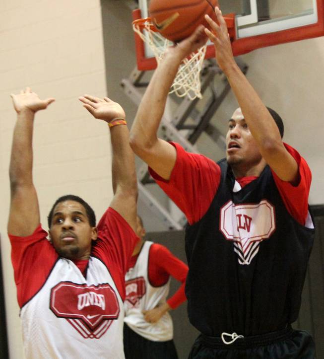 Chace Stanback shoots over Steve Jones during UNLV basketball practice at the Cox Pavilion on Monday, Nov. 2, 2009.