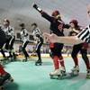 Referee Don Lastra signals the beginning of a period of play as the Las Vegas High Rollers play the 