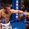 Jamie Varner (left) throws a right hook to Marcus Hicks during their WEC lightweight bout on Aug. 3,