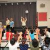 Daniel Neath tosses a ball Wednesday during a presentation at Cahlan-Edison Elementary School.