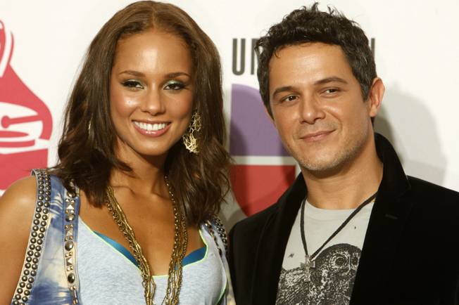 Performers Alicia Keys, left, and Alejandro Sanspose backstage at the 10th annual Latin Grammy Awards at the Mandalay Bay Events Center.