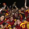 The Del Sol High football team celebrates winning the Henderson-based Southeast Division championship with a 46-26 victory against Coronado Friday night at Del Sol.  The winner annually receives the Henderson City Championship trophy.