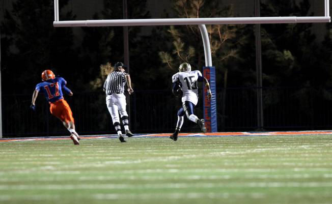 Cheyenne's Marquise Hall runs for a late touchdown Friday in the first round of the Sunset Regional quarterfinals against the Cheyenne. Gorman dominated with a 56-15 victory.