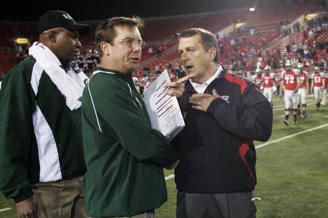 UNLV head coach Mike Sanford talks to Colorado State head coach Steve Fairchild after their game Saturday, November 7, 2009 at Sam Boyd Stadium.  UNLV won the game 35-16.