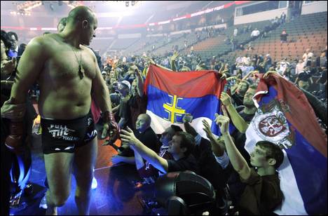 Fedor Emelianenko of Russia, celebrates with fans after knocking out Brett Rogers in the second round of the Strikeforce Mixed Martial Arts match at The Sears Centre Arena in Hoffman Estates, Ill. Saturday, Nov. 7, 2009.