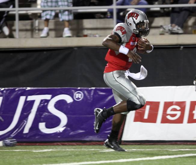 Omar Clayton runs it in for the first touchdown during the game against Colorado St. at Sam Boyd Stadium Saturday.  UNLV came out on top 35-16..