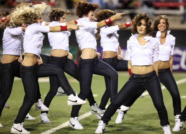 The Rebel Girls performs during a time out during the UNLV game against Colorado St. at Sam Boyd Stadium Saturday.  UNLV came out on top 35-16..