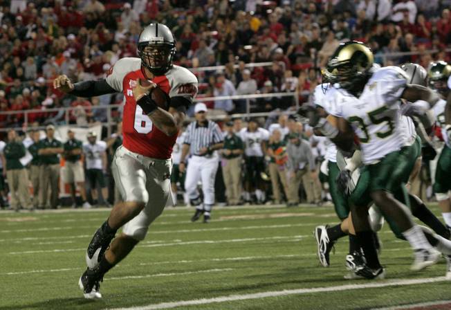 UNLV quarter back Mike Clausen runs in untouched for a touchdown during the game against Colorado St. at Sam Boyd Stadium Saturday. UNLV came out on top 35-16.