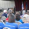 Members of the Blue Star Mothers organization listen to Henderson City Councilwoman Debra March give the keynote address Saturday at the Henderson Veterans Day Ceremony.