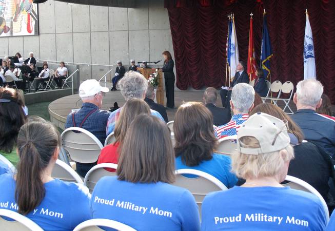 Members of the Blue Star Mothers organization listen to Henderson City Councilwoman Debra March give the keynote address Saturday at the Henderson Veterans Day Ceremony.