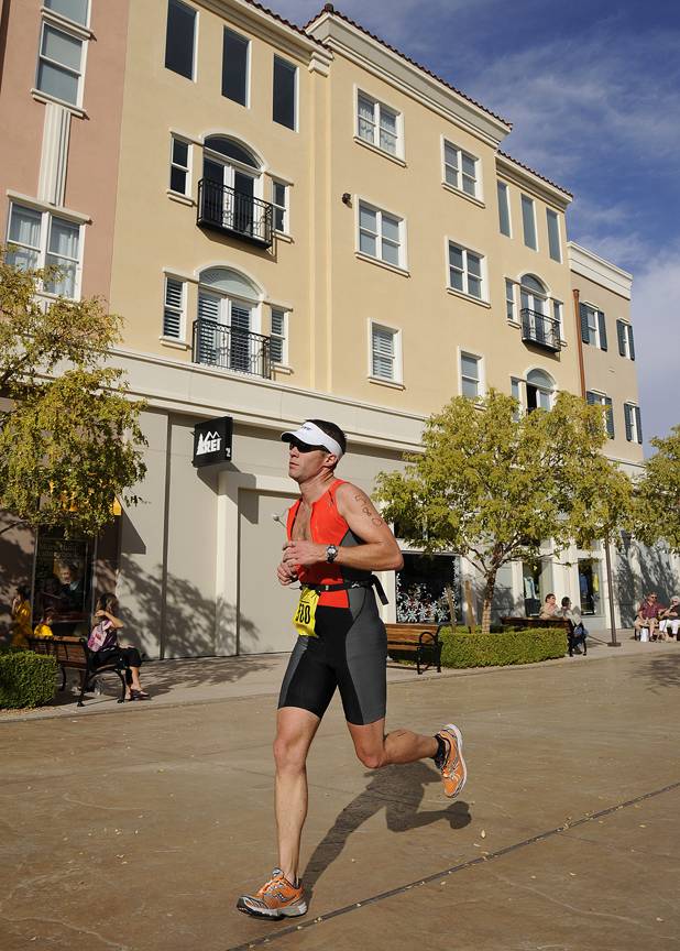 Bart Preston of Linden, Utah, makes his way through The District at Green Valley Ranch Resort while participating in the half course race of the 5th Annual Silverman Triathlon in Henderson on Sunday.
