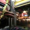 "Kay," a dancer from Deja Vu Showgirls, performs some pole dancing moves while inside a truck with strippers from Little Darlings to advertise the clubs on the Las Vegas Strip late in the evening Monday, Nov. 9, 2009. The image shot won the top photography award in the Nevada Press Association contest.