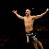Mike Swick celebrates his second-round TKO win over Ben Saunders at UFC 99 in Lanxess Arena in Germany on June 13, 2009. 