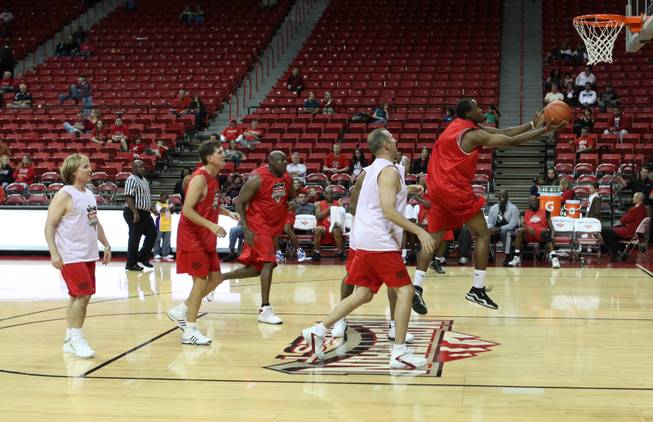 Lamar Bigby of the Red team attempts a layup Tuesday during the UNLV basketball program's annual alumni game. 