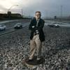 Brookings Institution senior fellow Pietro S. Nivola stands on a roadside Wednesday in Henderson. Ni