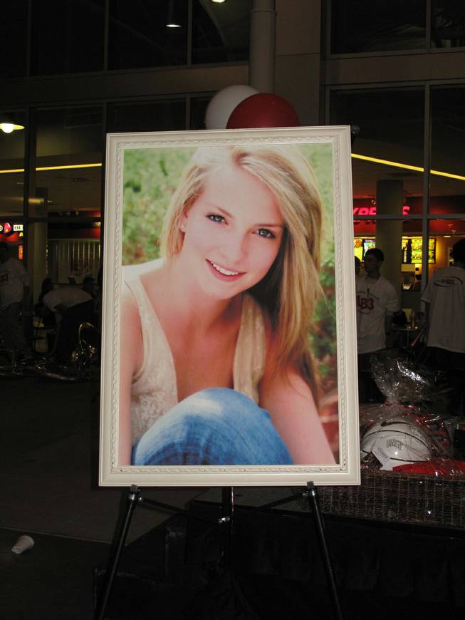 A poster of Lindsay Bennett at last night's Lindsay Bennett Memorial kick-off event at the university. Bennett, a former Rebel Girl, died in an alleged drunk driving accident in April.