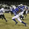 Basic wide receiver DeShawn Nixon rushes the ball for a large gain against Desert Pines Friday during the Sunrise Region playoff game at Basic. The Wolves were victorious over the Jaguars 24-17.