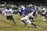 Basic wide receiver DeShawn Nixon rushes the ball for a large gain against Desert Pines Friday during the Sunrise Region playoff game at Basic. The Wolves were victorious over the Jaguars 24-17.