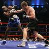Yuri Foreman, right, lands a punch on Vinroy Barrett during the 8th round of a junior middleweights 