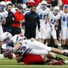 Air Force receiver Kevin Fogler stretches for a first down against Utah in the Falcons' 23-16 overtime loss to the Utes on Oct. 24. Fogler, who averages 23.4 yards per catch for Troy Calhoun's 6-4 club, could be an x-factor when they meet 4-6 UNLV this weekend in Colorado Springs in what is a do-or-die contest for the Rebels.