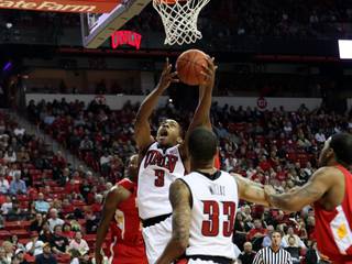 UNLV freshman Anthony Marshall looks to score Saturday against Pittsburg State in the season opener for both teams at the Thomas & Mack Center. The Rebels blew it open in the second half with a 91-52 victory.