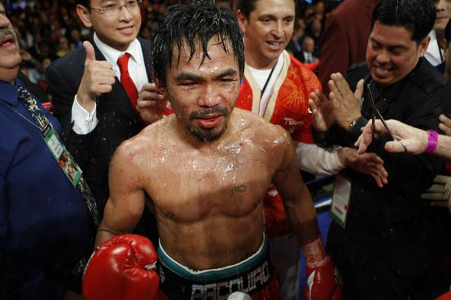 Manny Pacquiao stands in the ring following his WBO welterweight title fight against Miguel Cotto on November 14, 2009 at the MGM Grand Garden Arena.