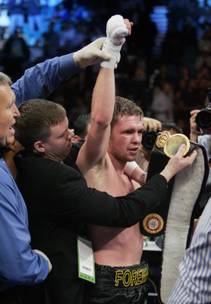 Foreman wins super welterweight title