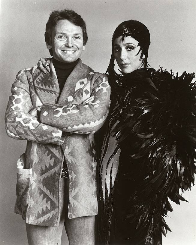 
Bob Mackie, pictured with Cher in 1975, has known her for 42 years and designs her costumes for her show here. 