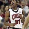 UNLV guard Justin Hawkins celebrates a turnover against UNR during the second half of their game Wednesday, November 18, 2009 at the Thomas & Mack Center. UNLV won the intrastate rivalry 88-75.