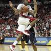 UNLV guard Oscar Bellfield drives for two of his 22 points against UNR during the second half of their game Wednesday, November 18, 2009 at the Thomas & Mack Center. UNLV won the intrastate rivalry 88-75.